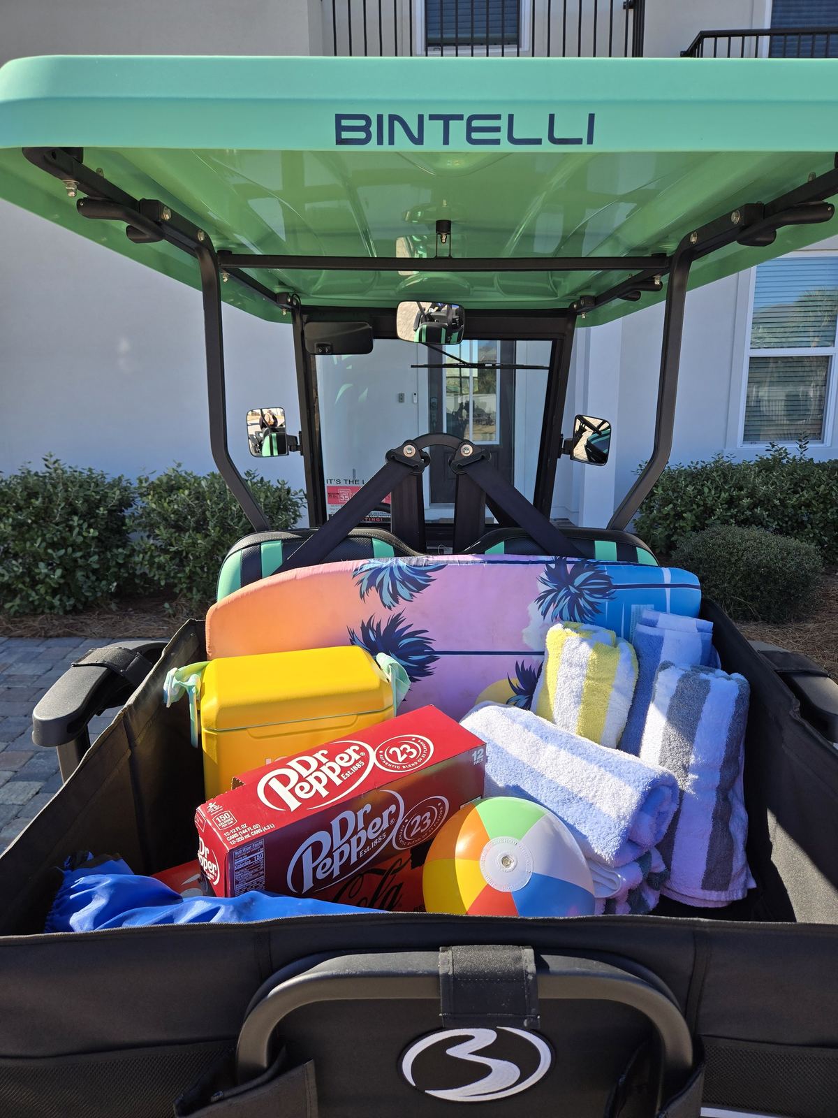 Beach Better golf cart loaded with beach gear, ready for a day on the Emerald Coast